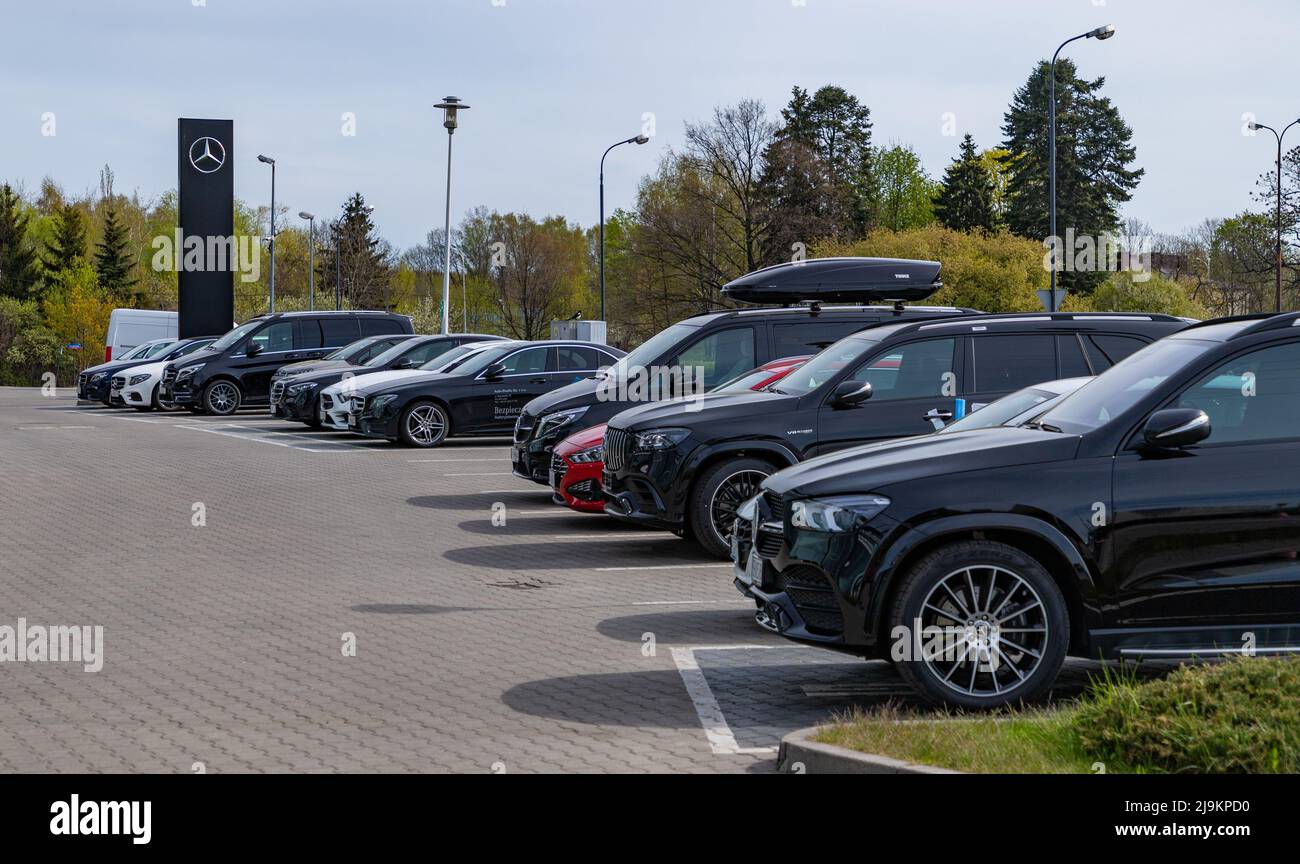 A picture of multiple vehicles at a Mercedes Benz car dealership, in Poland. Stock Photo