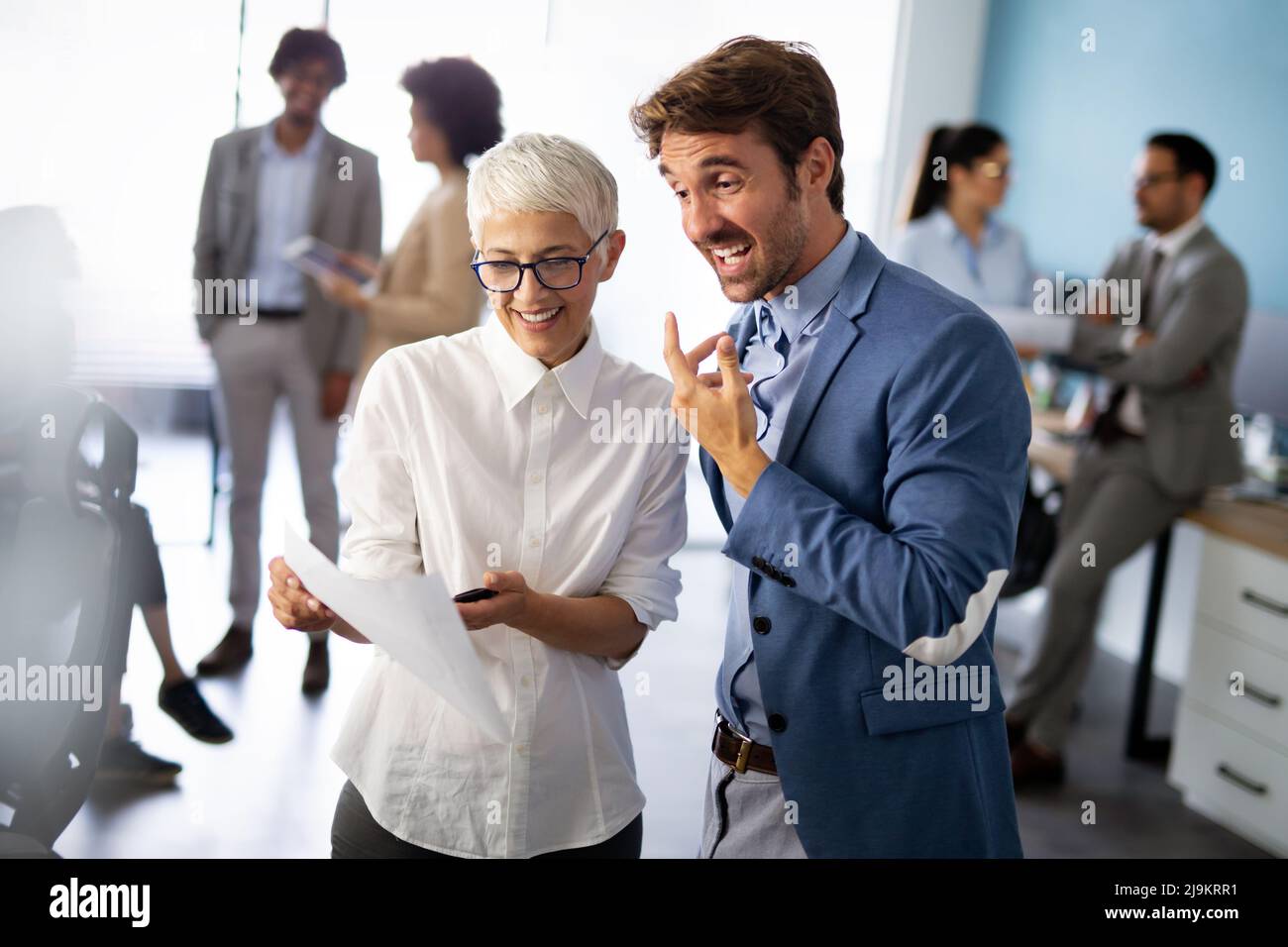 Collaboration and analysis by business people working in office Stock Photo