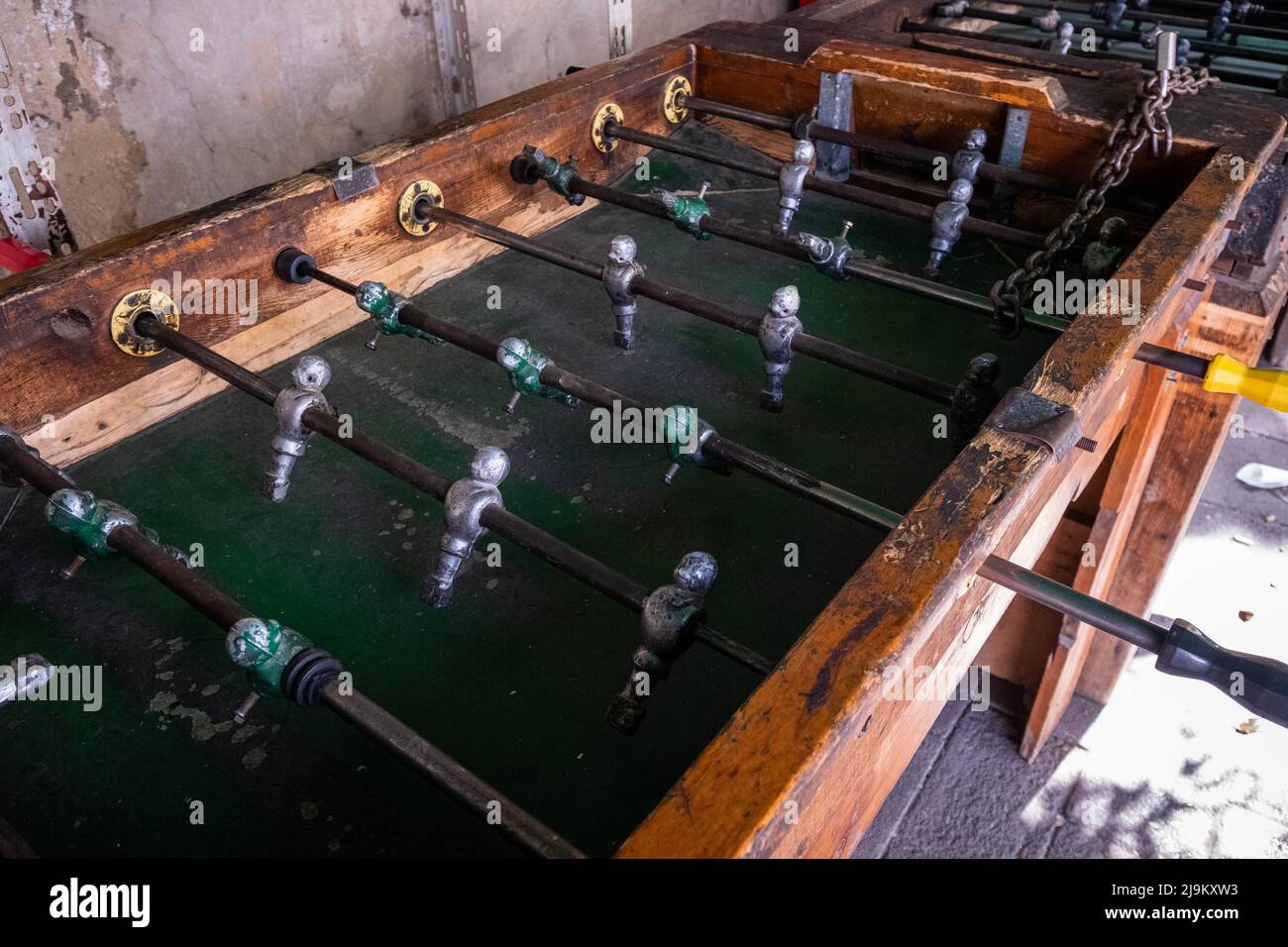 old table soccer or kicker table Stock Photo
