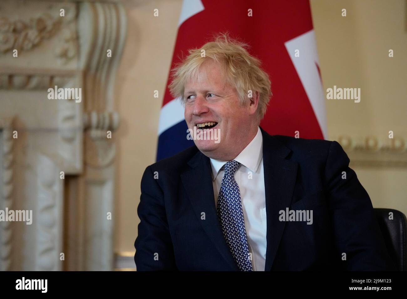 Prime Minister Boris Johnson listens to the Emir of Qatar, Sheikh Tamim bin Hamad Al Thani, at the start of their meeting in 10 Downing Street, London. Picture date: Tuesday May 24, 2022. Stock Photo