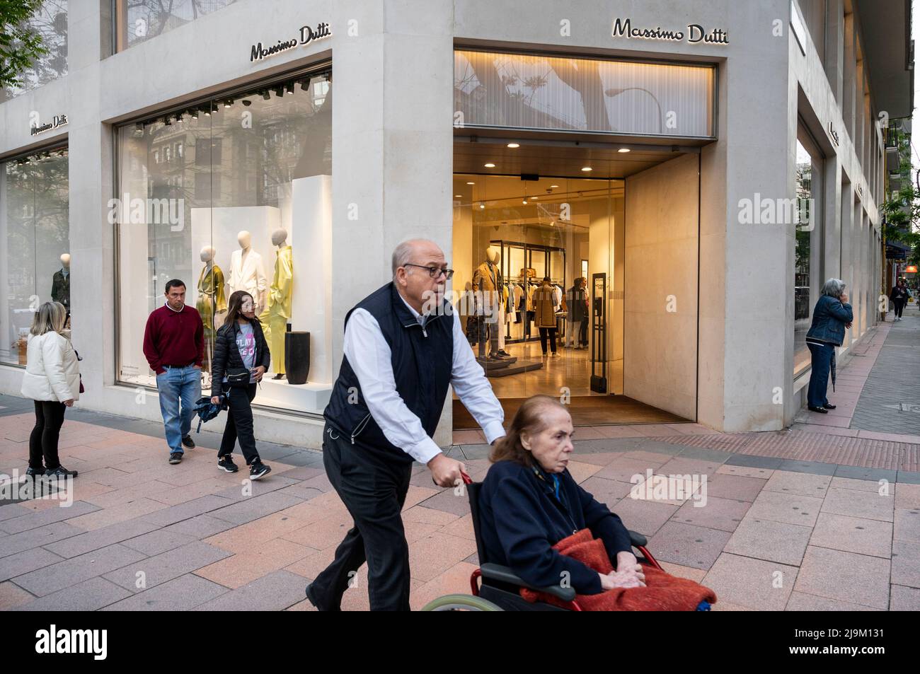 Pedestrians walk past the Spanish clothing manufacturing and brand Massimo  Dutti store in Spain. (Photo by Xavi Lopez / SOPA Images/Sipa USA Stock  Photo - Alamy