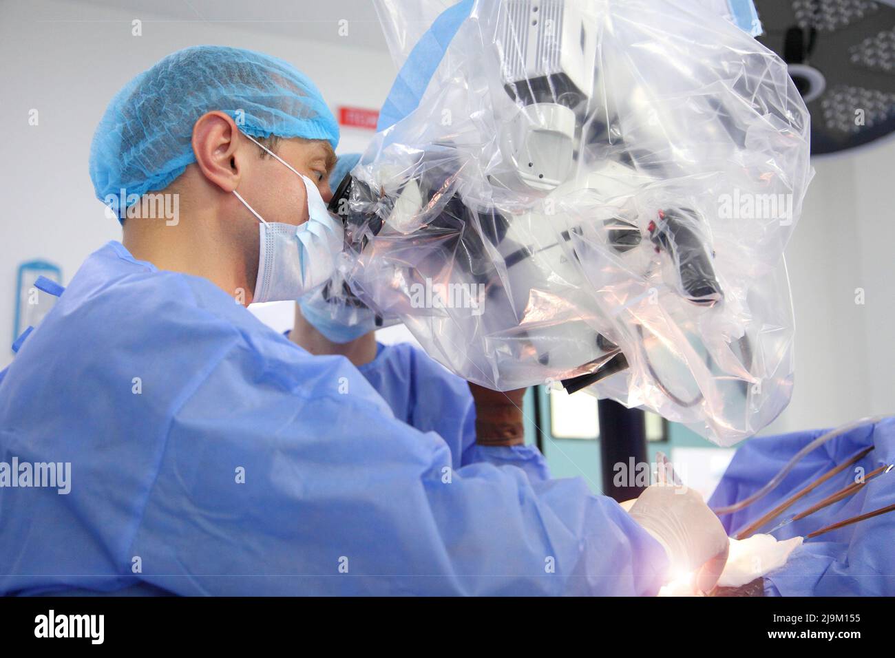 Treatment of a brain aneurysm. Surgical operation on the brain. A team