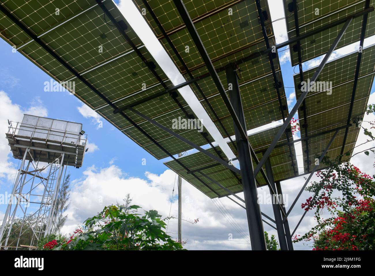 KENYA, Namanga, solar panel for solar powered water pump to fill a tank