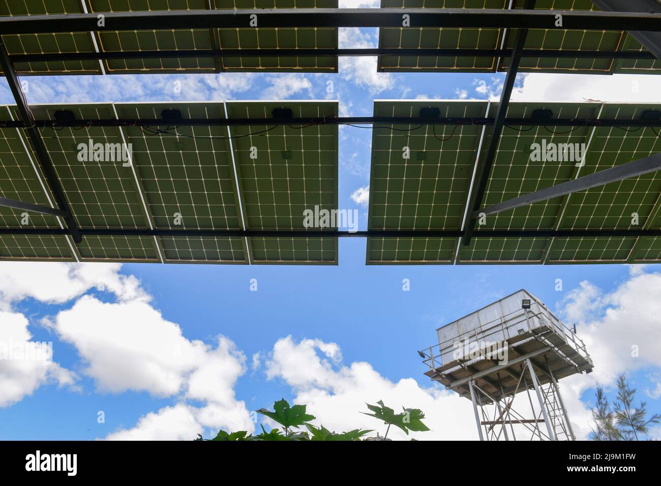 KENYA, Namanga, solar panel for solar powered water pump to fill a tank