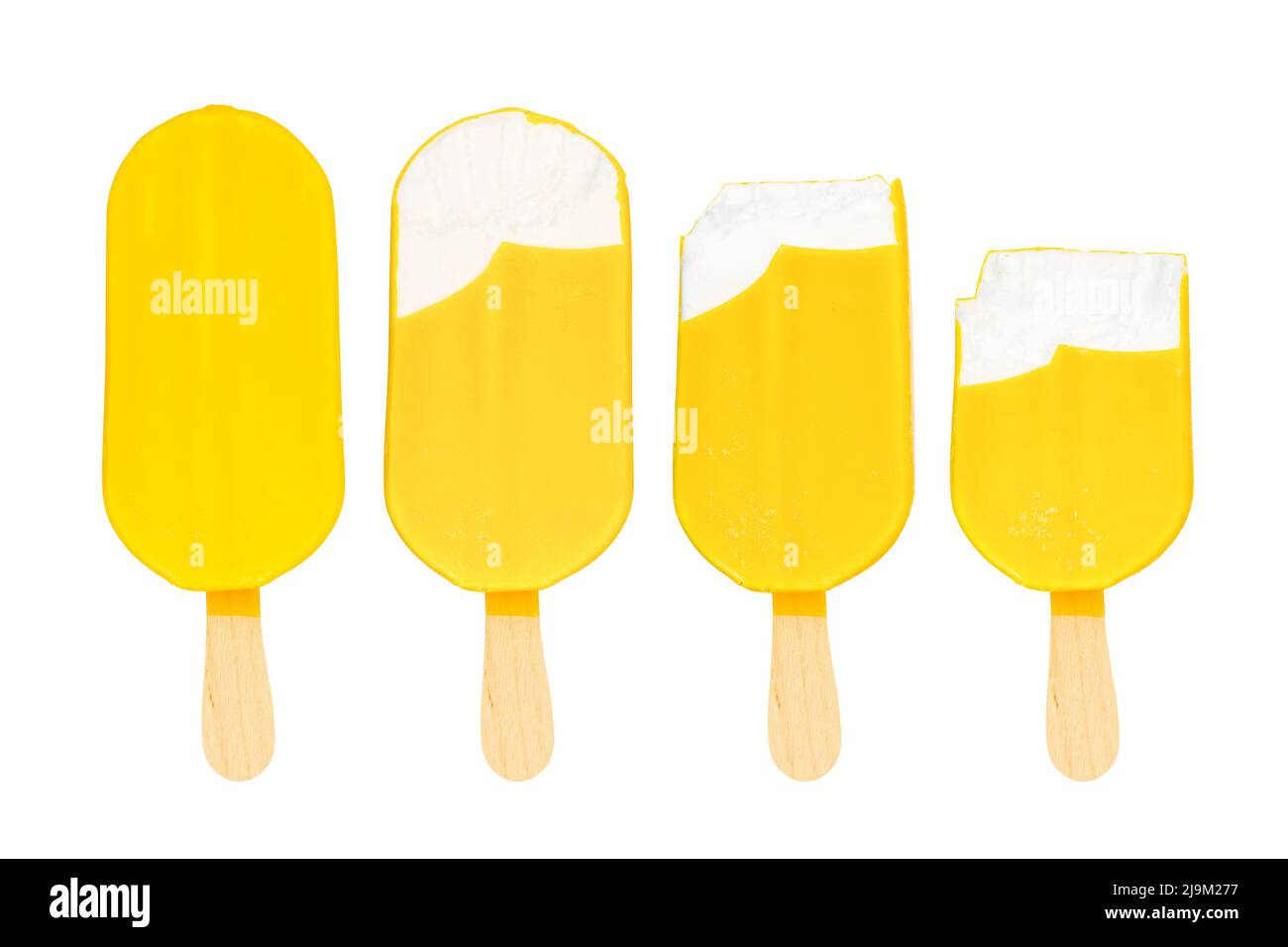 Bitten yellow ice cream bars arranged in a row, isolated on white background. Stock Photo