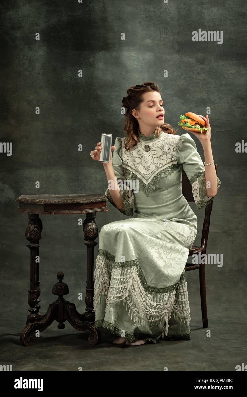 Conceptual portrait of young charming girl in image of medieval royal ...