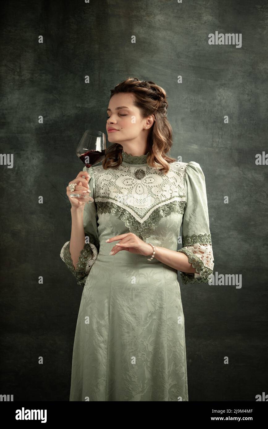 Conceptual portrait of young charming girl in image of medieval royal ...