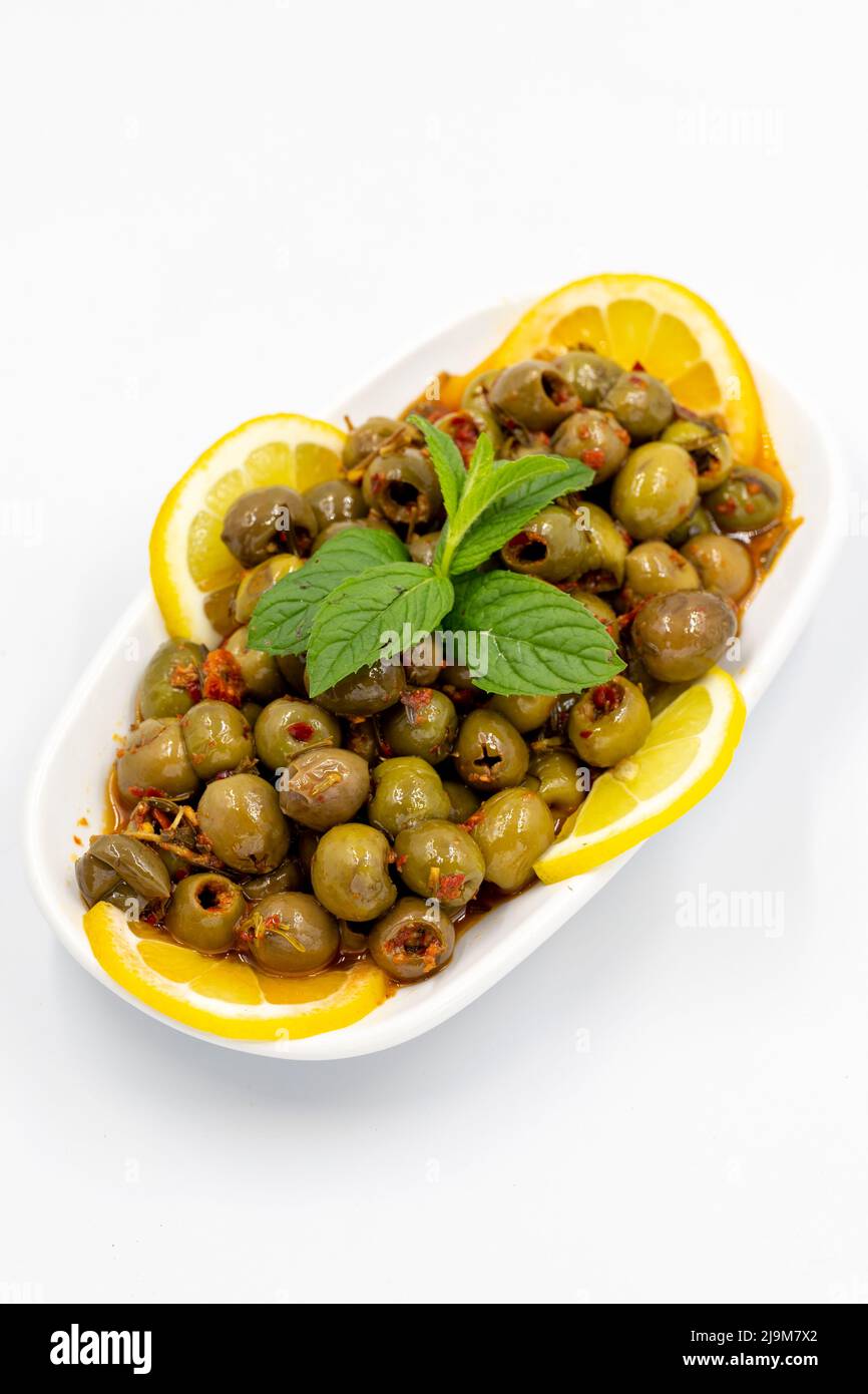 Green olive. Olives with special sauce isolated white background