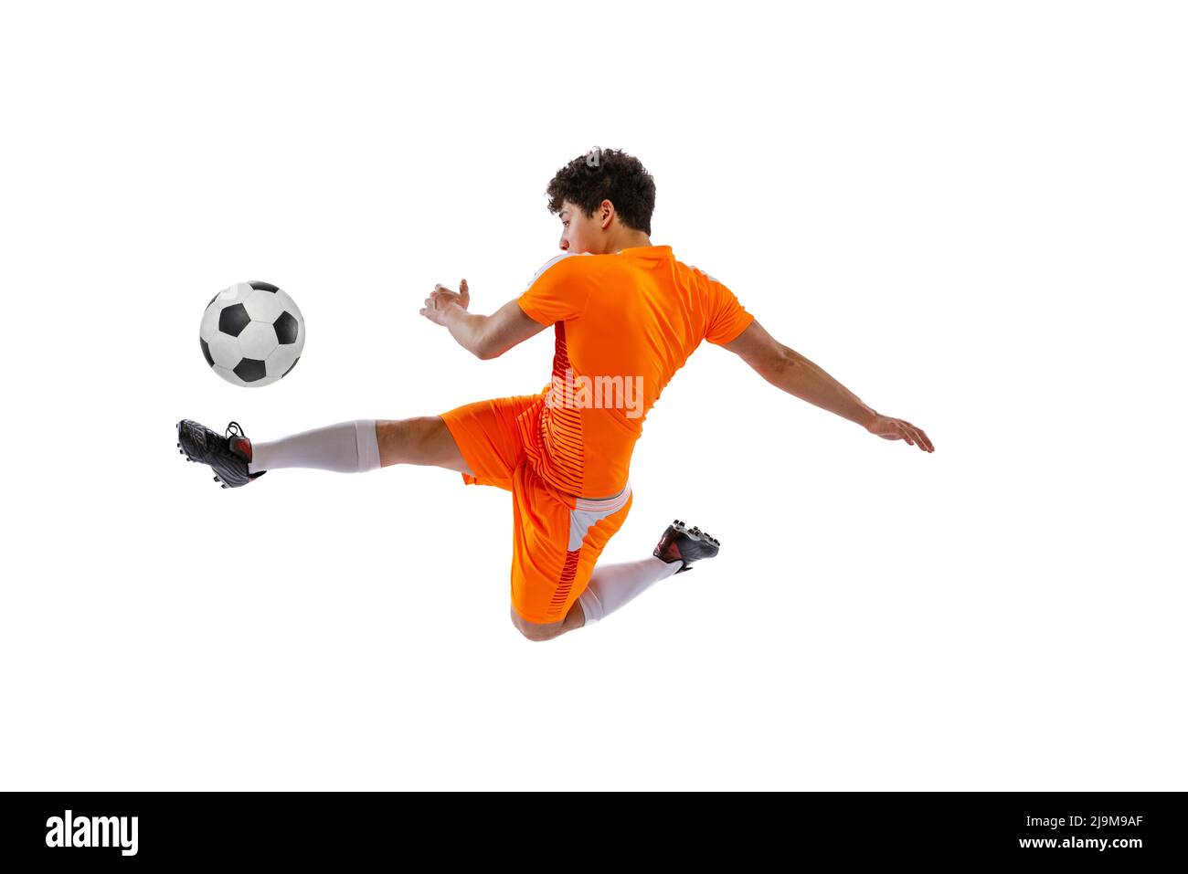 Professional football, soccer player in motion isolated on white studio  background. Concept of sport, match, active lifestyle, goal and hobby Stock  Photo - Alamy
