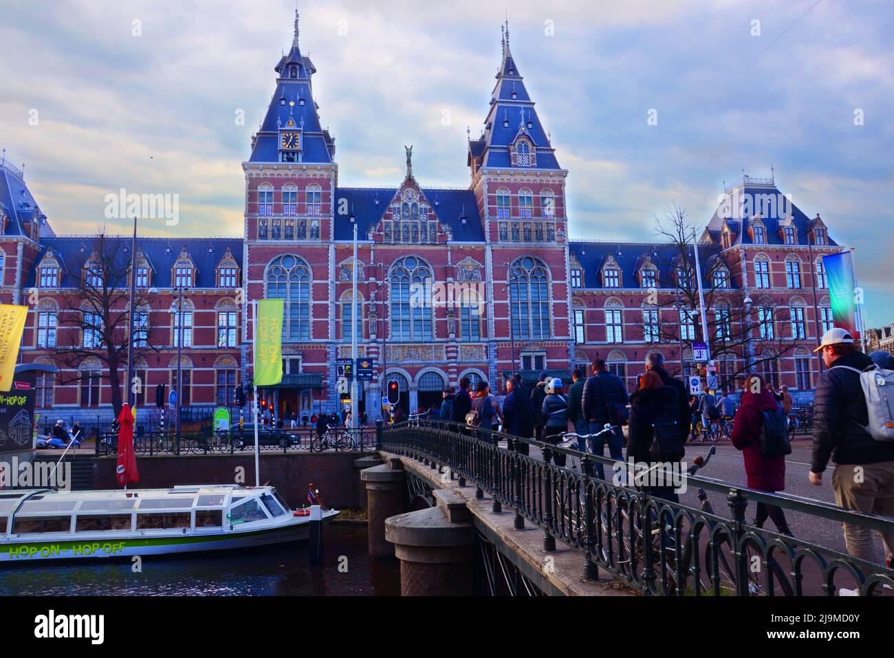 Tourists at the famous Rijks Museum and hop on hop off cruise near ...