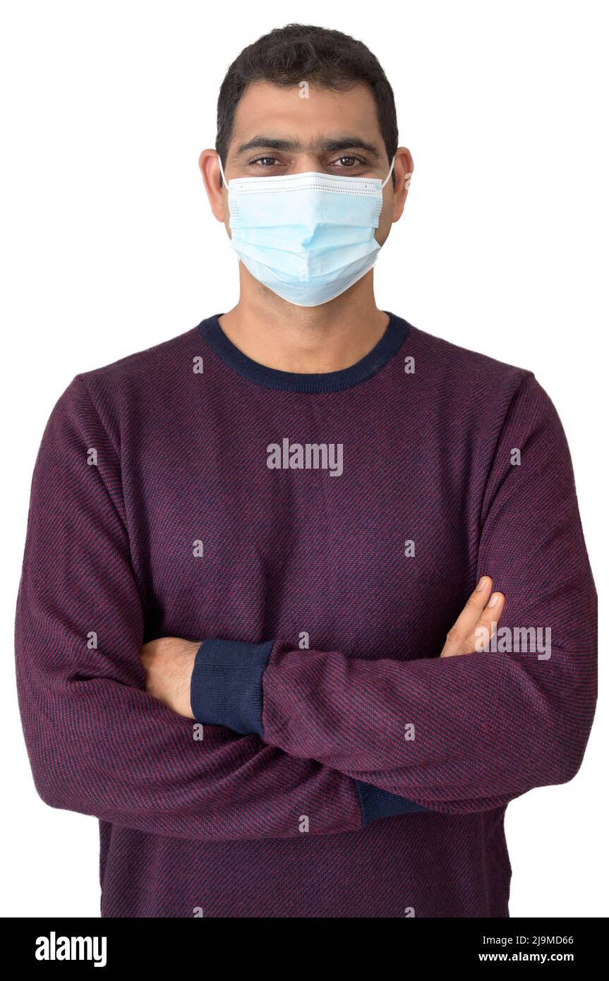 Portrait of an Indian male model wearing a disposable mask and with ...
