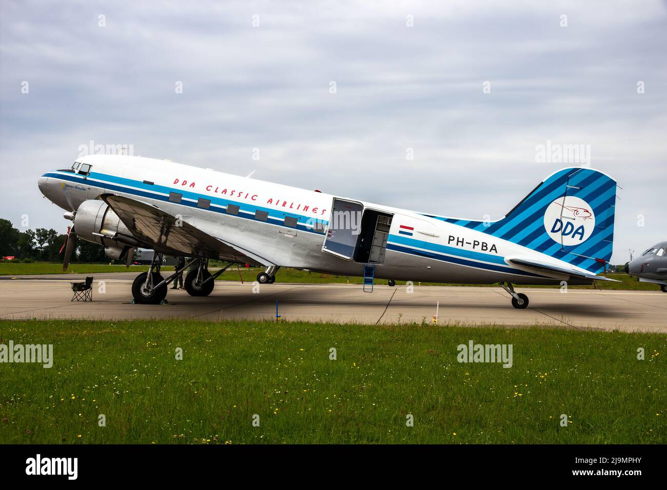 Classic Douglas DC-3 Dakota plane on the tarmac of Leeuwarden Air Base. The Netherlands - June 10, 2016 Stock Photo