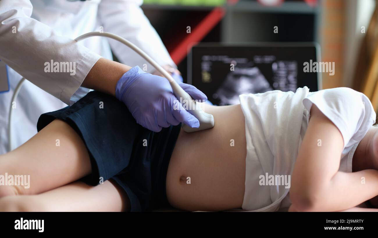 Medical examination of little girl using ultrasound equipment Stock Photo