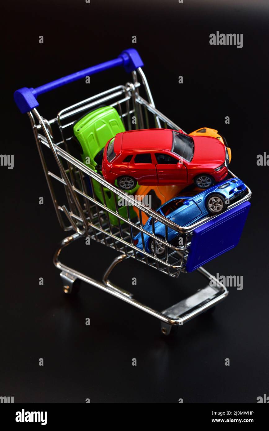 shopping cart with toy cars Stock Photo Alamy
