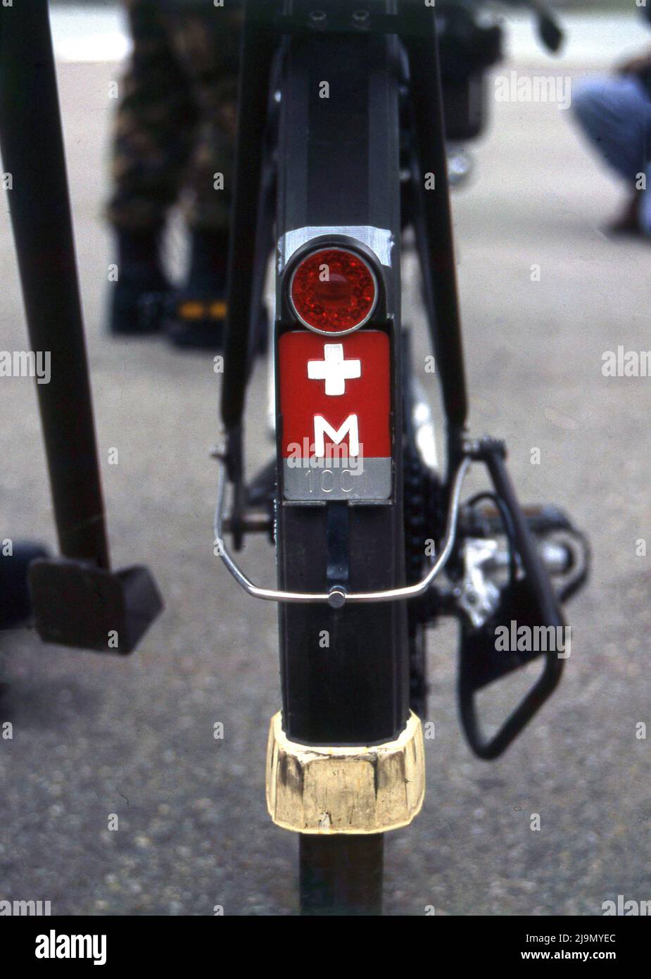 circa 2000, the Swiss army bicycle, MO-93, rear view showing national flag. This bicycle was the first major development on the original MO-05, introduced in 1905. The Swiss army bicycle or velo militaire has been a part of the national defence of Switzerland for a hundred years, as a form of transport, that if needed,  could move swiftly to defend against invading forces. It's use in the Swiss Army dates back to 1891 and although there was talk in 2001 of phrasing them out, a new Swiss Army bike, the MO-12 was introduced in 2012. Stock Photo