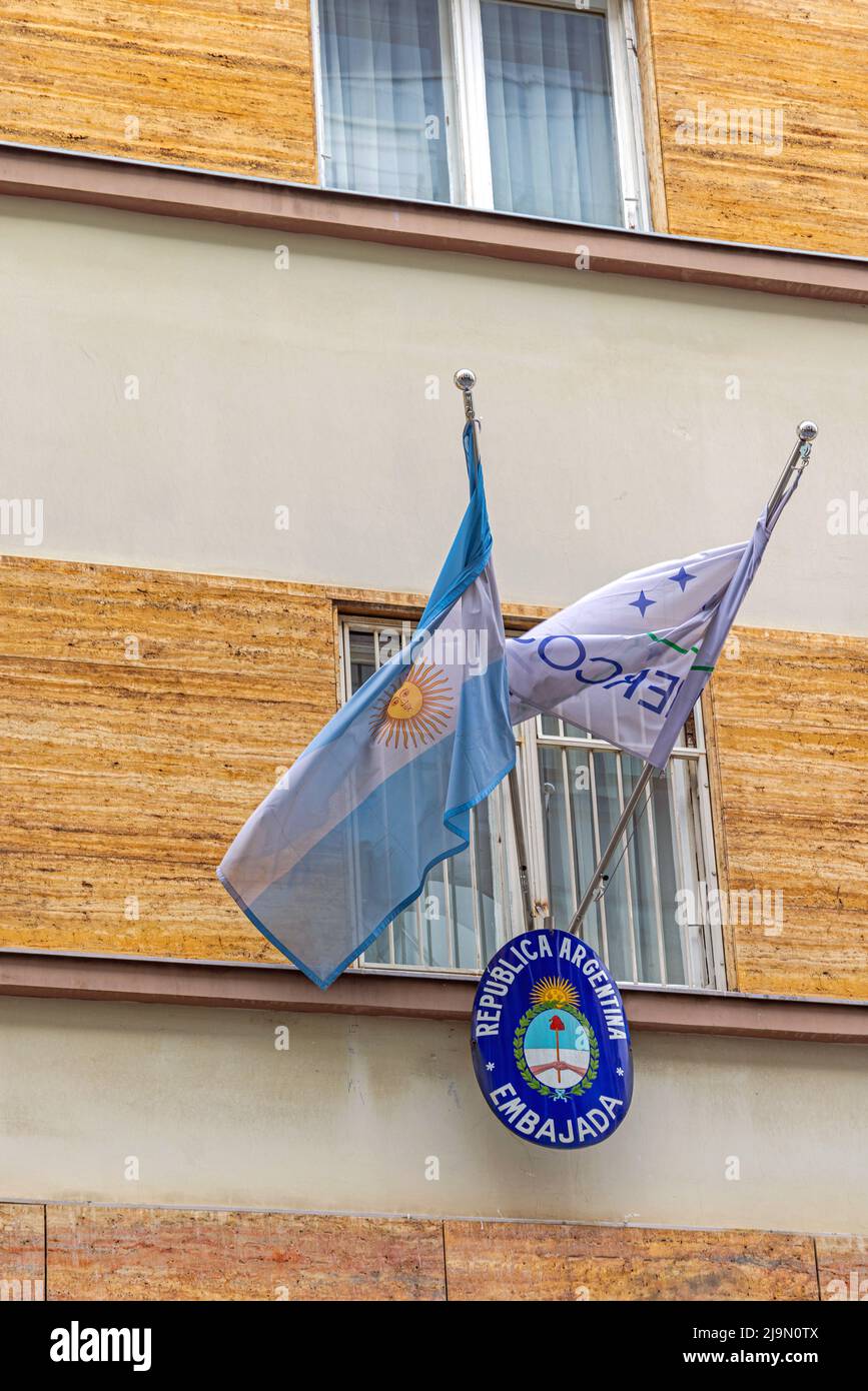 Belgrade, Serbia - April 09, 2022: Republic of Argentina National Flag and Coat of Arms ar Embassy Building. Stock Photo