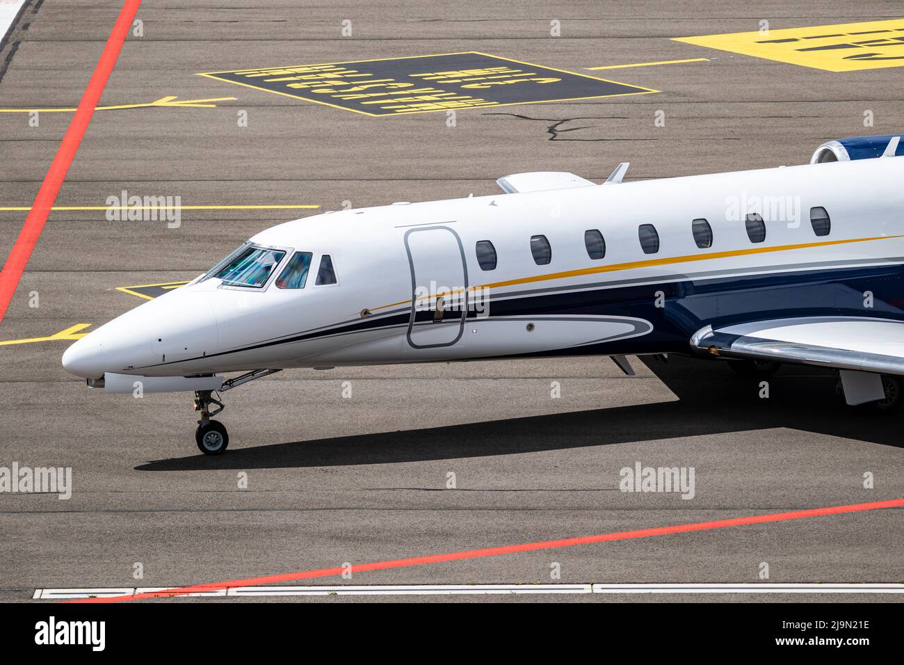 Private jet on the platform at the airport Stock Photo