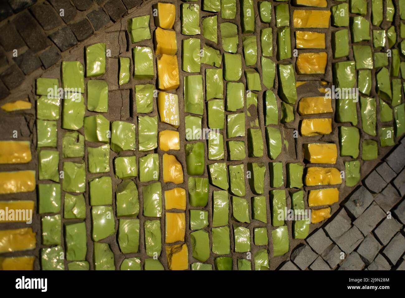 Tiles made of stone. pattern of shards of glass. Mosaic wall Stock