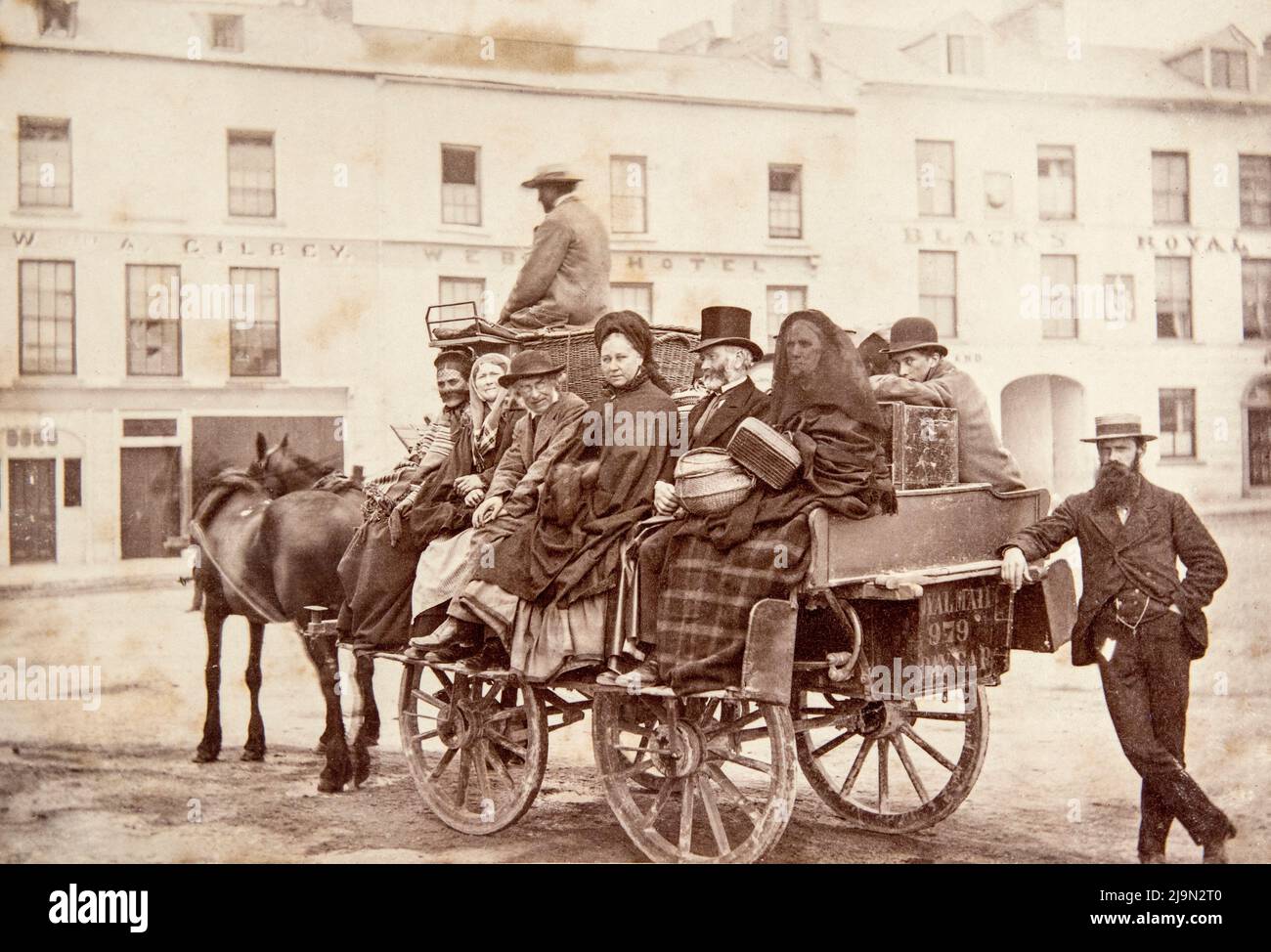 A royal mail carriage, on Eyre Square in Galway city, Ireland, 1880s Stock Photo