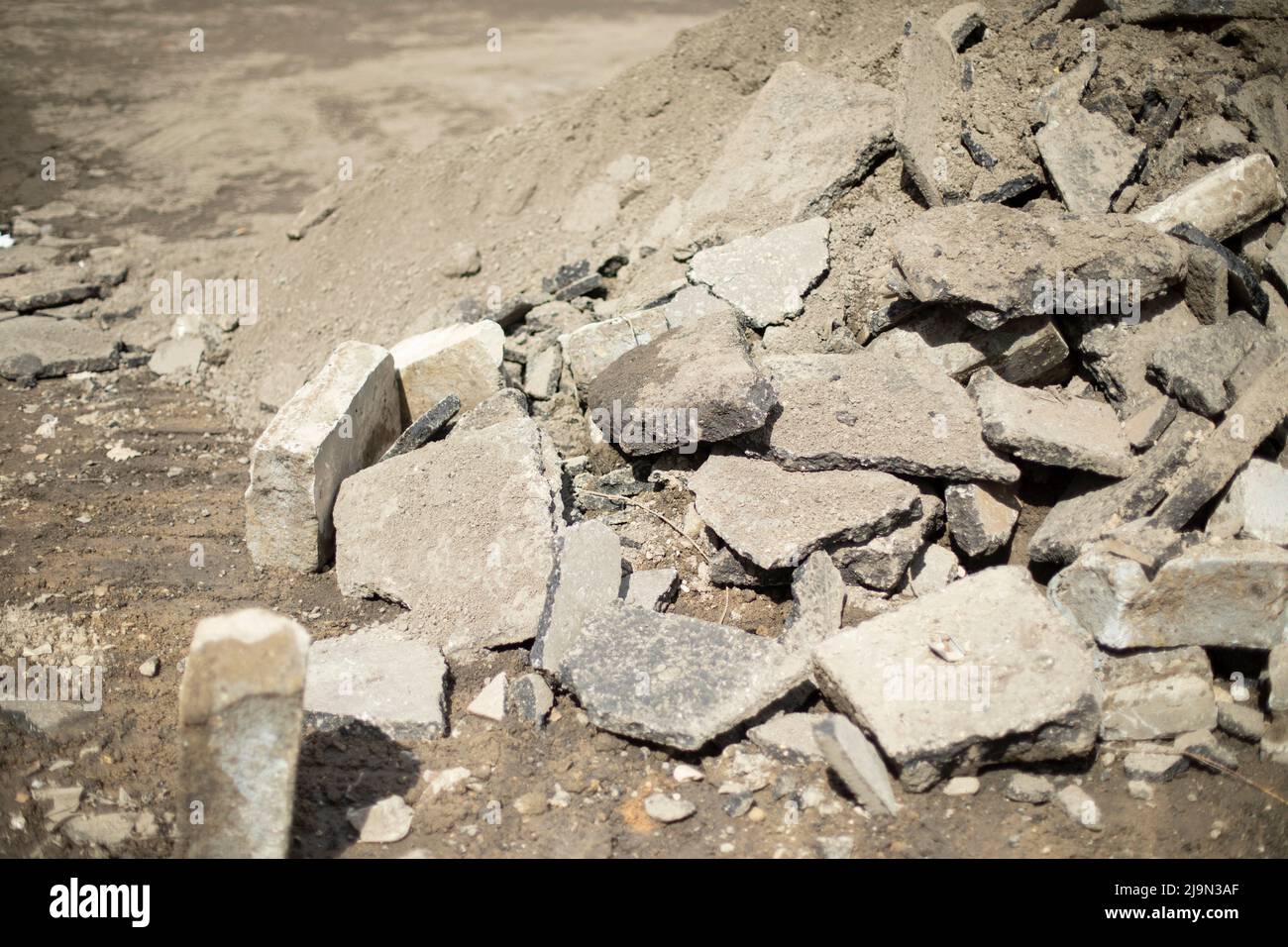 Construction waste. Broken stone. Building material. Lots of stones. Stock Photo