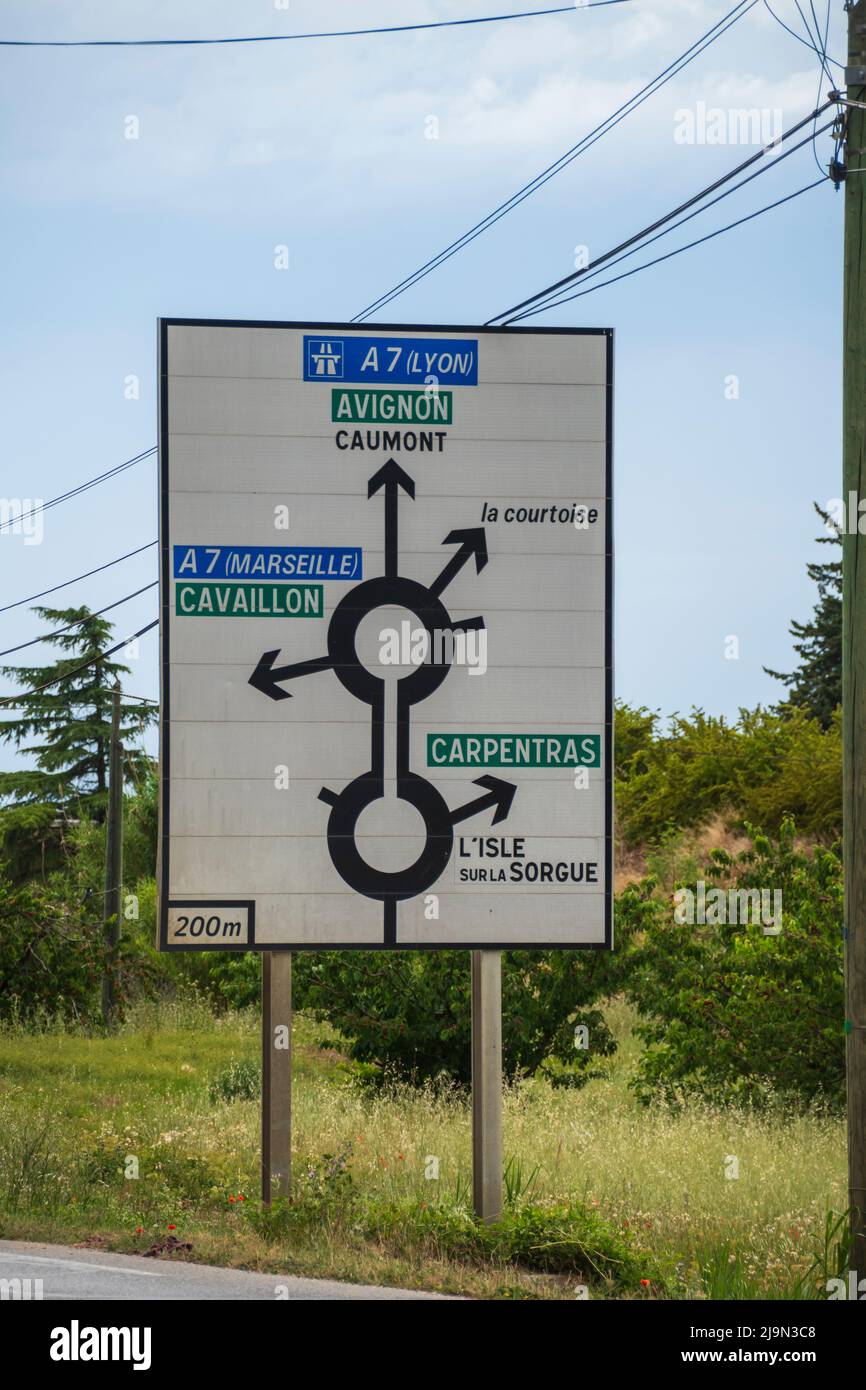 Road sign announcing two successive roundabouts , France Stock Photo