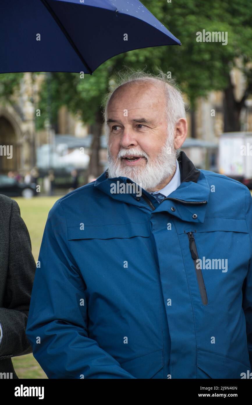 Francie Molloy attends, the British government plan to change the law in relation to the British agent and soldier who murder Irish Catholic and Irish Republic exempt from prosecution. The victims of the families here to seeking justice curry a coffin in front of Downing street, London, UK. - 24 May 2022. Stock Photo