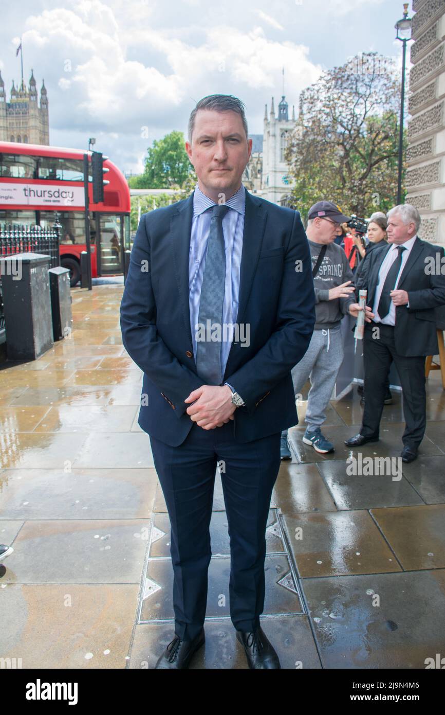 John Finucane attends, the British government plan to change the law in relation to the British agent and soldier who murder Irish Catholic and Irish Republic exempt from prosecution. The victims of the families here to seeking justice curry a coffin in front of Downing street, London, UK. - 24 May 2022. Stock Photo
