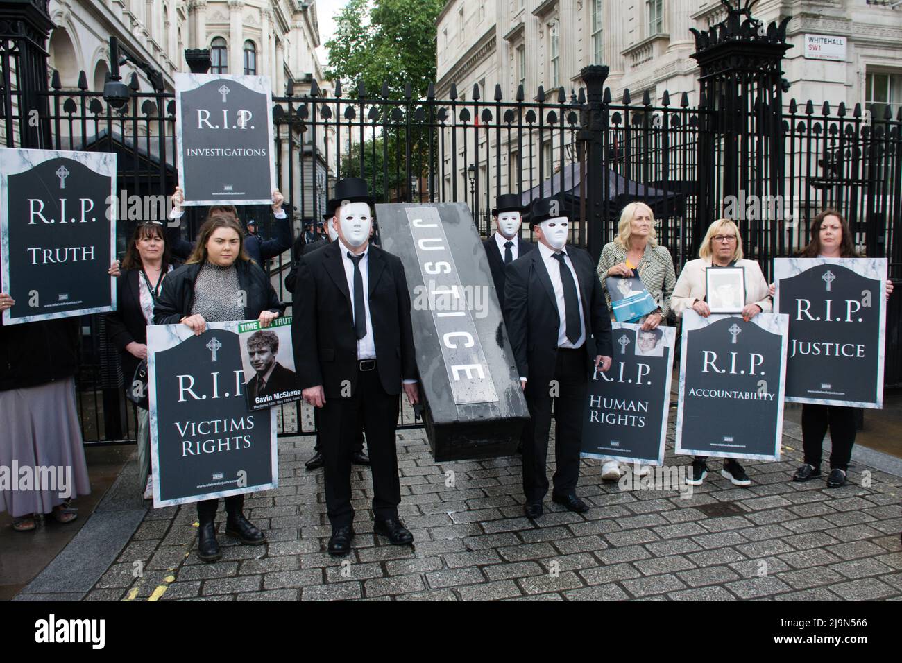 The British government plan to change the law in relation to the British agent and soldier who murder Irish Catholic and Irish Republic exempt from prosecution. The victims of the families here to seeking justice curry a coffin in front of Downing street, London, UK. - 24 May 2022. Stock Photo