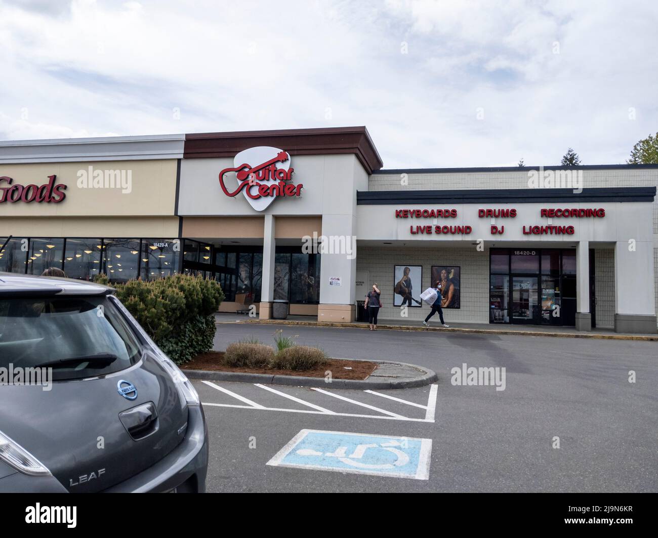 Lynnwood, WA USA - circa May 2022: Exterior view of the front of a Guitar Center store in a strip mall area. Stock Photo
