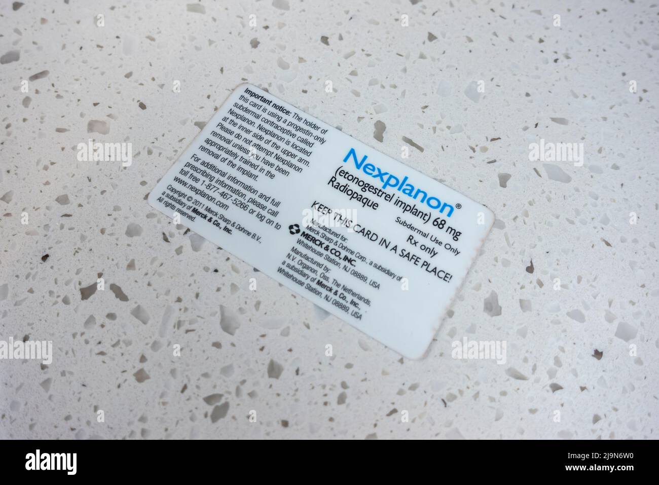 Seattle, WA USA - circa May 2022: View of a Nexplanon implant plastic card, meant for a woman to keep in her wallet to remind of insertion date Stock Photo