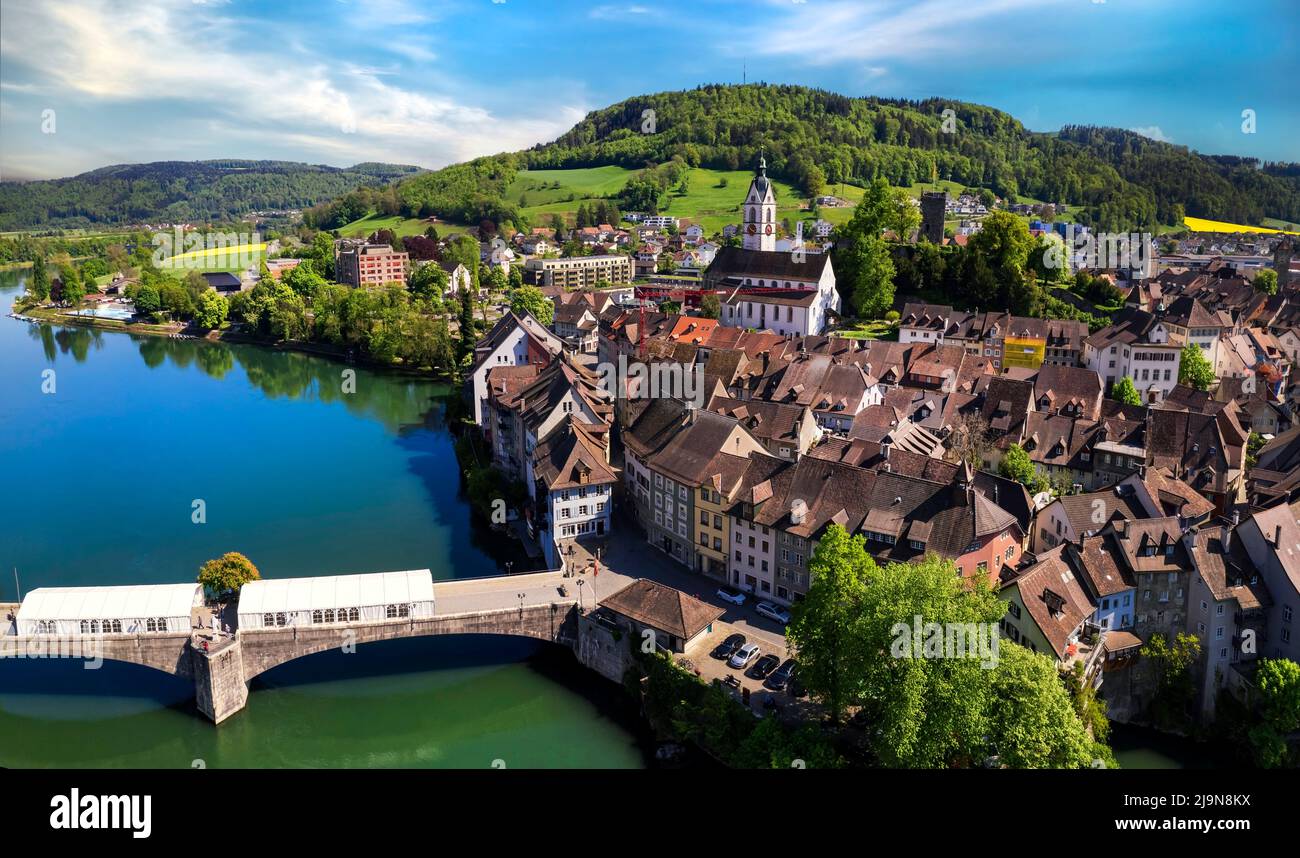 Romantic beuatiful paces of Switzerland . Laufenburg town over Rhein river. popular tourist destination, border with Germany. Aerial panoramic view Stock Photo