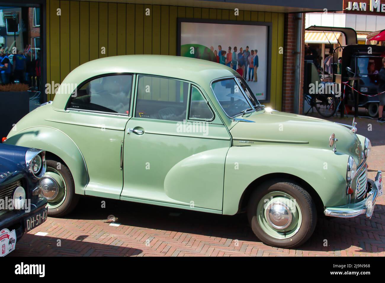 Vintage car Morris Minor 1956 at a classic car show in Uithuizen, Groningen, the Netherlands Stock Photo