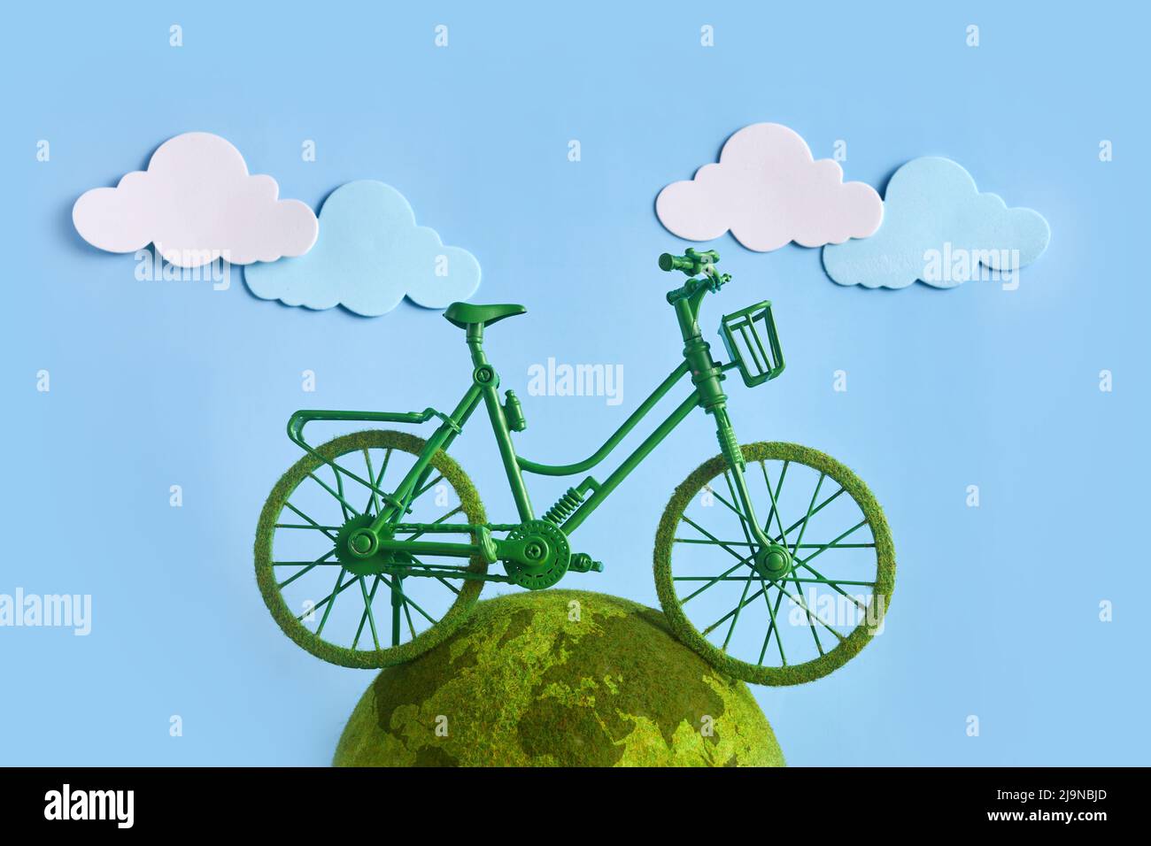 World Bicycle Day. Green bicycle and world. Environment preserve Stock