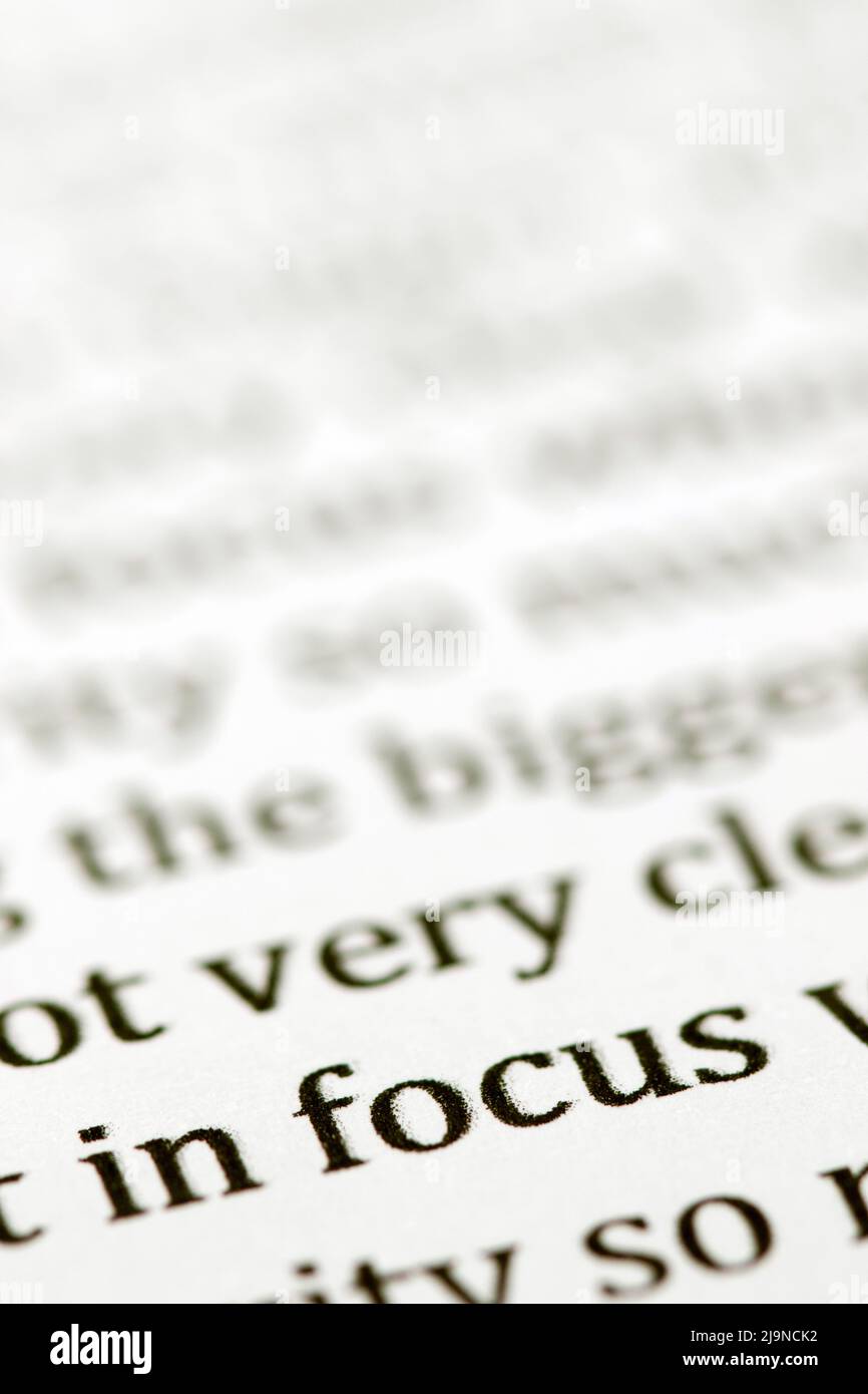 Close up of the typed words in focus printed in black ink on white ink jet paper Stock Photo