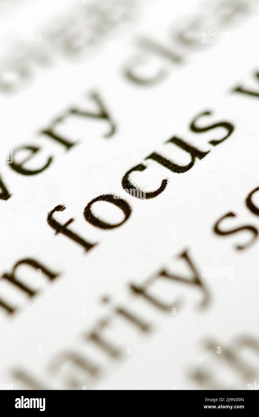 Close up of the typed word focus printed in black ink on white ink jet paper Stock Photo