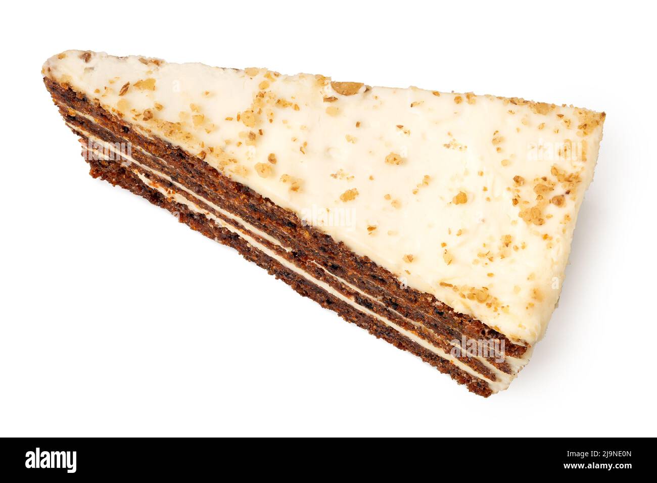Slice of carrot cake with cream cheese filling and frosting isolated on white. Top view. Stock Photo