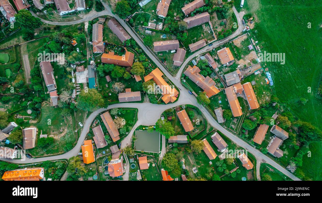 Aerial view of a small village.Top view of traditional housing estate in Czech. Looking straight down with a satellite image style.Houses from above, Stock Photo