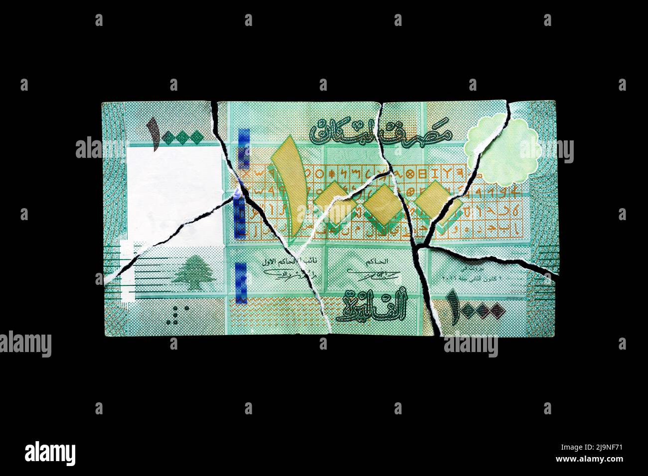 Ripped one thousand Lebanese pounds bill, currency of Lebanon Stock Photo