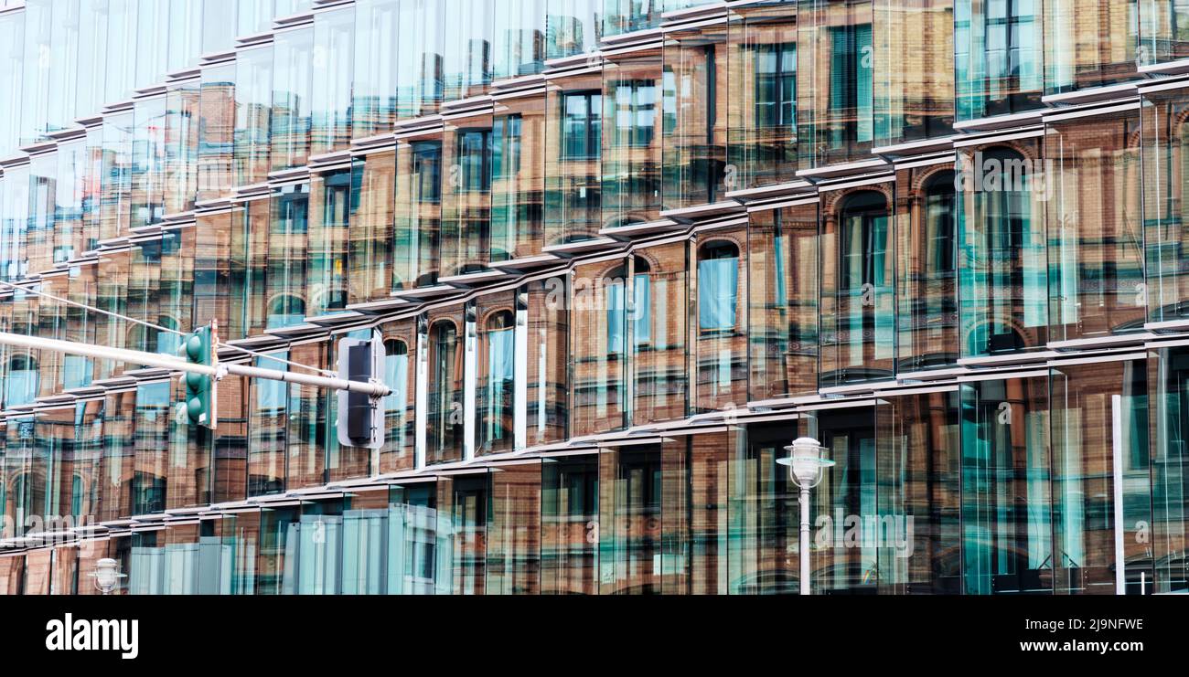 Photo taken during a trip to Berlin. A walk through the streets of the city brought some surprises in the form of a beautifully reflecting facade. Stock Photo