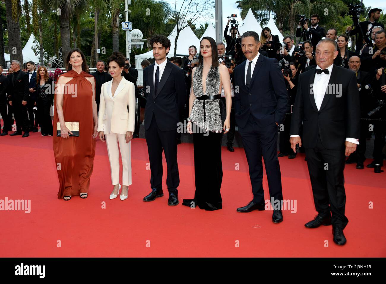 Cannes, France. 24th May, 2022. 75th Cannes Film Festival 2022, Red Carpet 75th Anniversary Celebration Screening Of The Innocent. Pictured Anouk Grinberg, Louis Garrel, Noémie Merlant, Roschdy Zem, Anne-Dominique Toussaint, Jean-Claude Pautot Credit: Independent Photo Agency/Alamy Live News Stock Photo