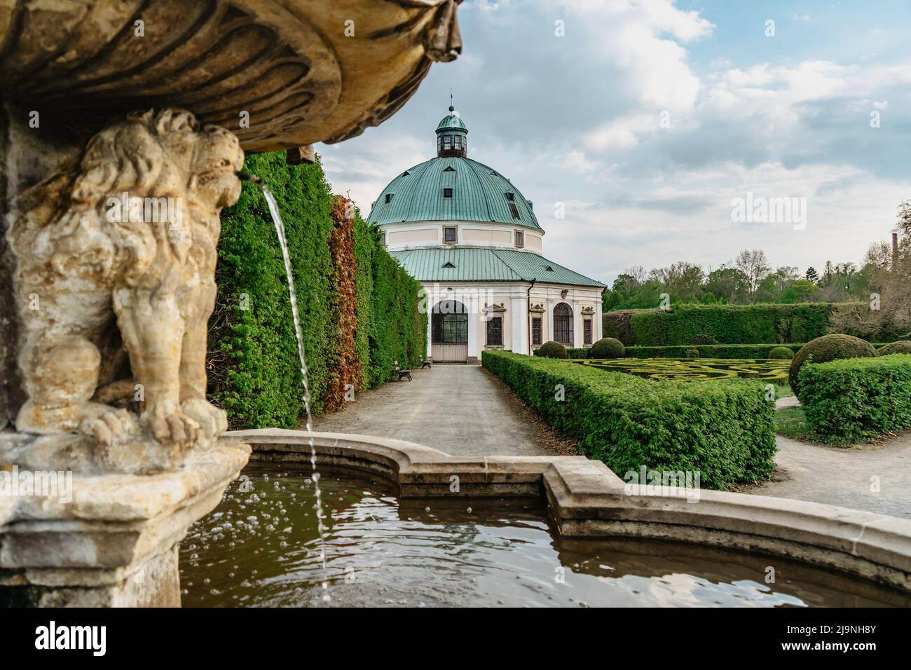 Kromeriz,Czech Republic-May 3,2022.Lion Fountain in Flower Garden built in Baroque French-style,included in UNESCO world heritage list.Labyrinth of gr Stock Photo
