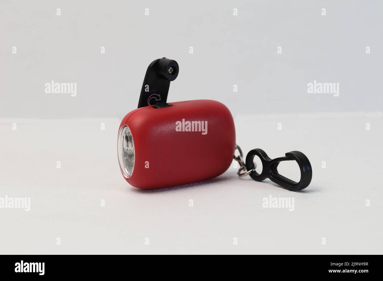 Dynamo flashlight. Compact, ideal for backpacks, gear bag for glove compartments. Just wind handle to charge, no battery to replace. Stock Photo