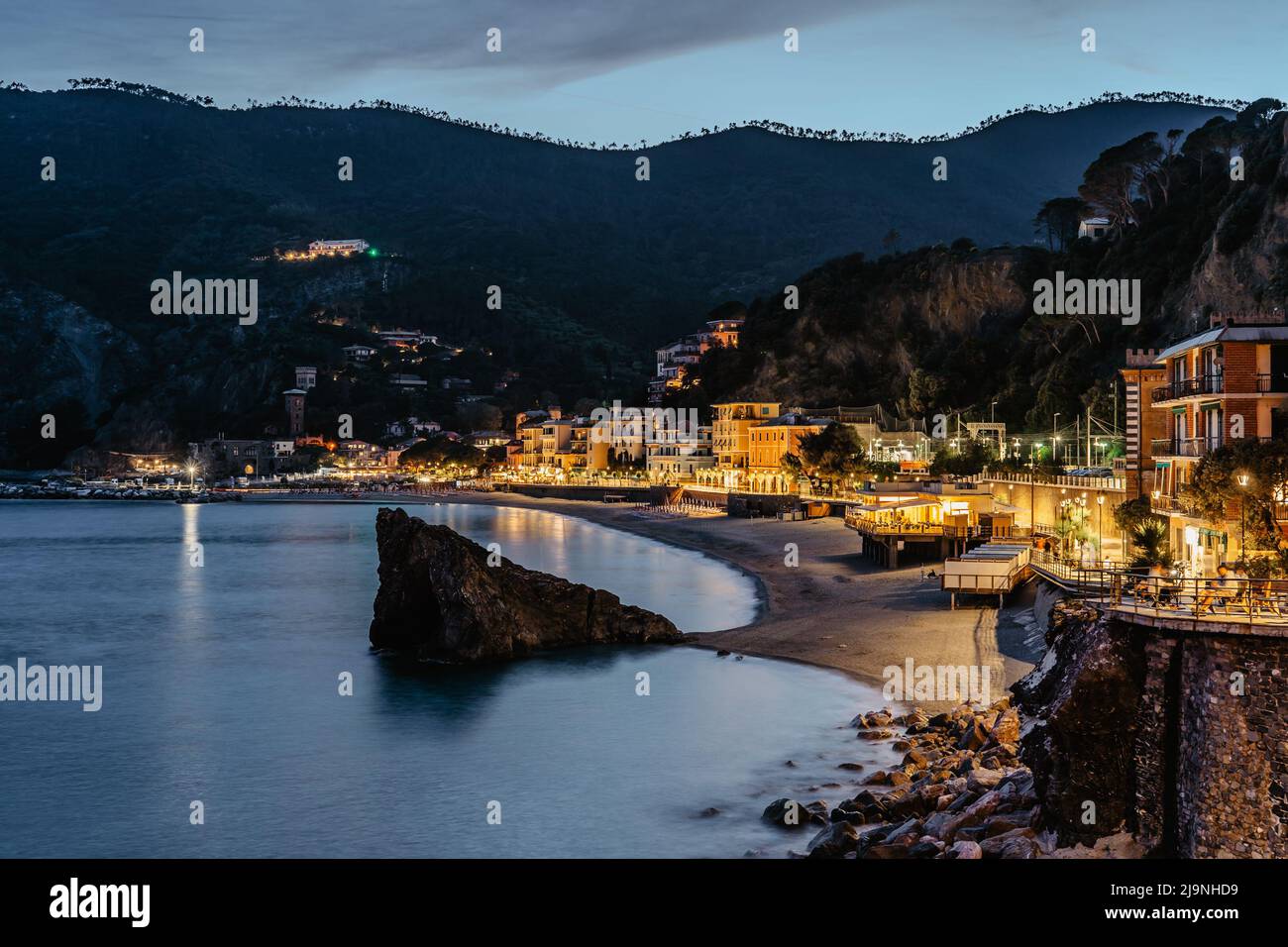 Evening view of Monterosso and landscape of Cinque Terre,Italy.UNESCO Heritage Site.Picturesque colorful coastal village located on hills.Summer Stock Photo