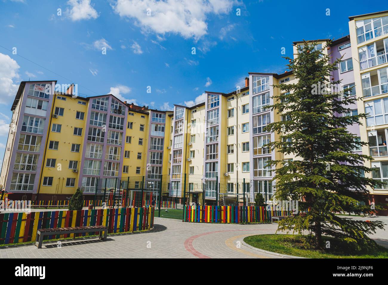 Image showcasing New residential high-rise buildings. Apartments with balconies in a new ...