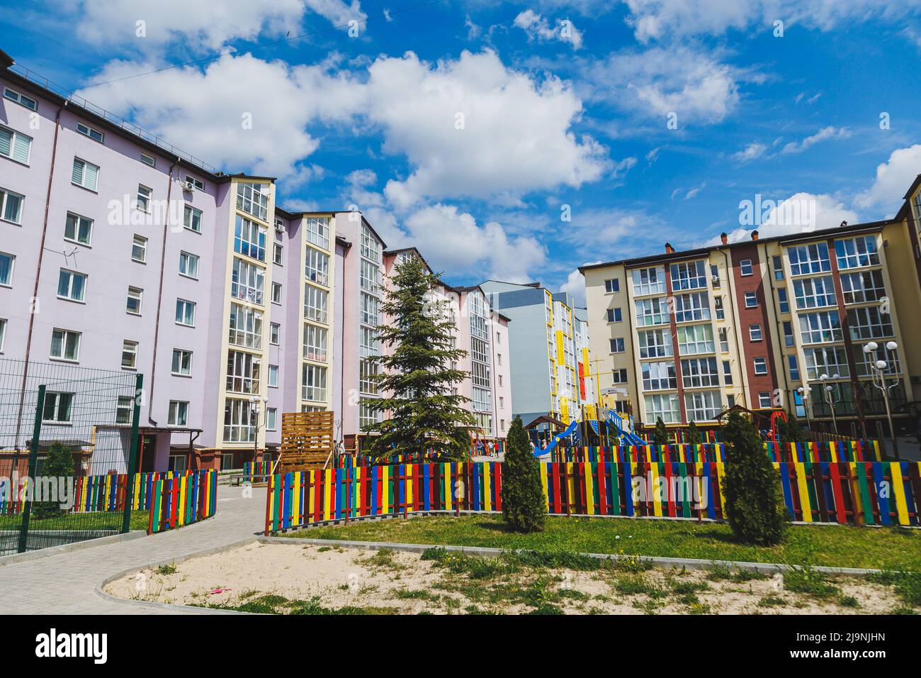 Image showcasing New residential high-rise buildings. Apartments with balconies in a new ...