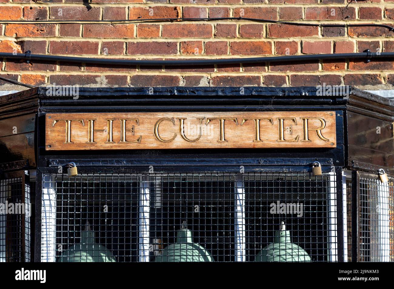 Sign for The Cutter Barbershop on Middle Row in Stevenage Old Town, Hertfordshire, UK Stock Photo