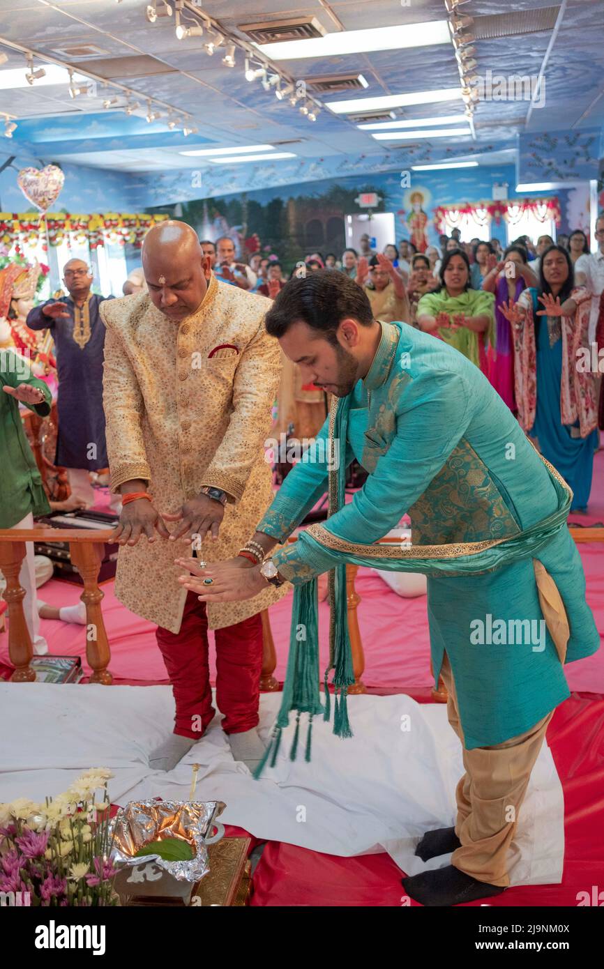 A Hindu man celebrates his 50th birthday and performs the arti ritual ...