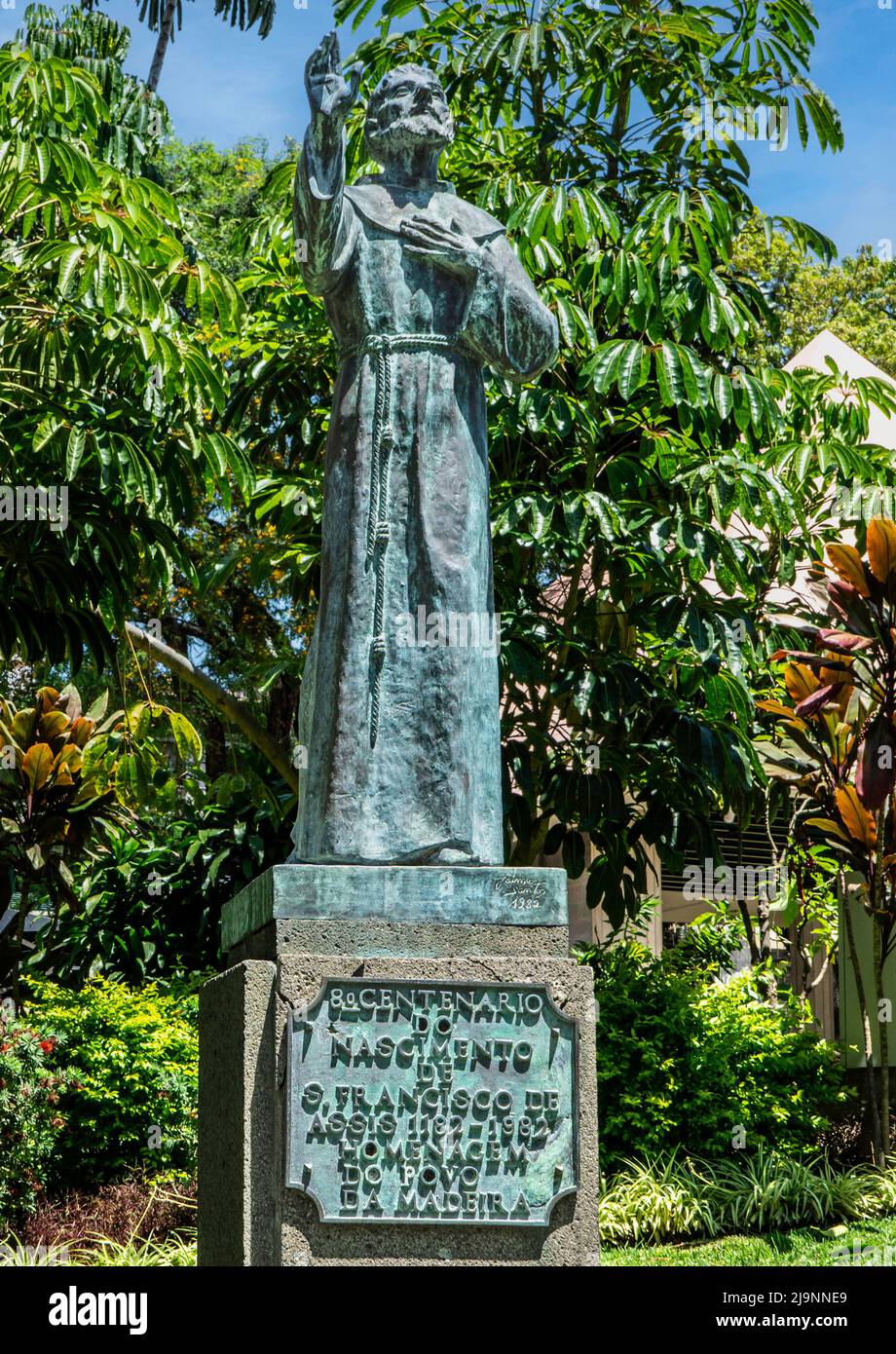 The bronze statue of St Francis of Assisi in the Municipal Gardens, Funchal, Madeira. Sculptor Jaime Santos. Stock Photo