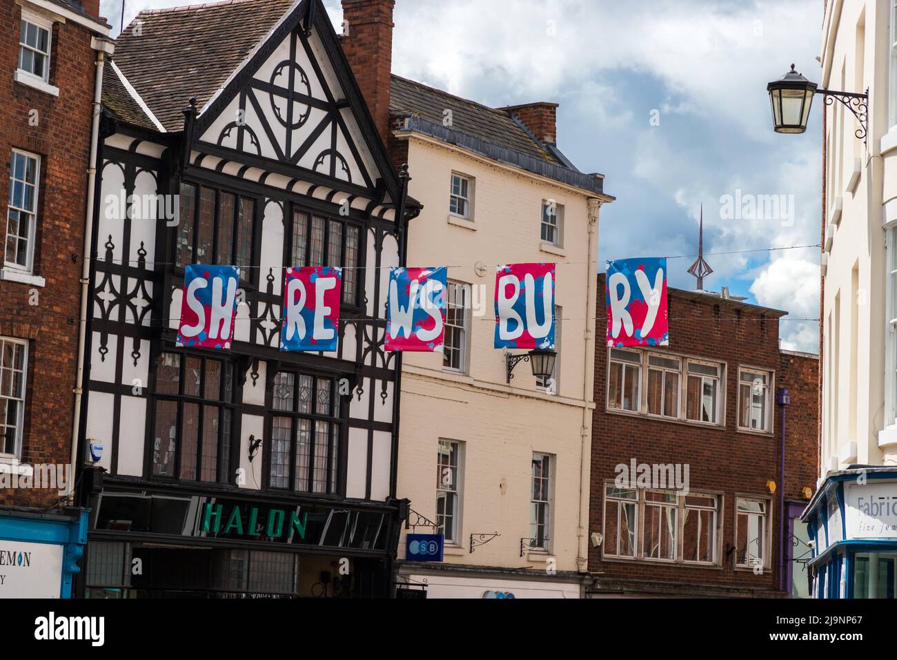 Shrewsbury town name bunting raised in the street in Shrewsbury Stock Photo