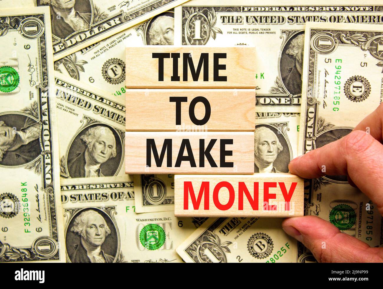 Time to make money symbol. Concept words Time to make money on wooden